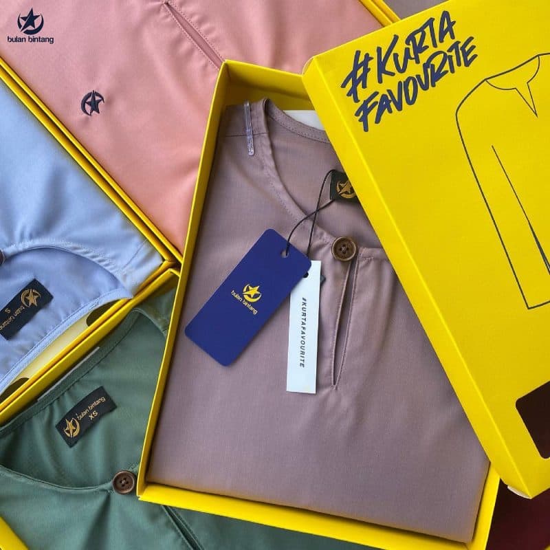 Bulan Bintang traditional clothing in pastel colours, presented in yellow boxes